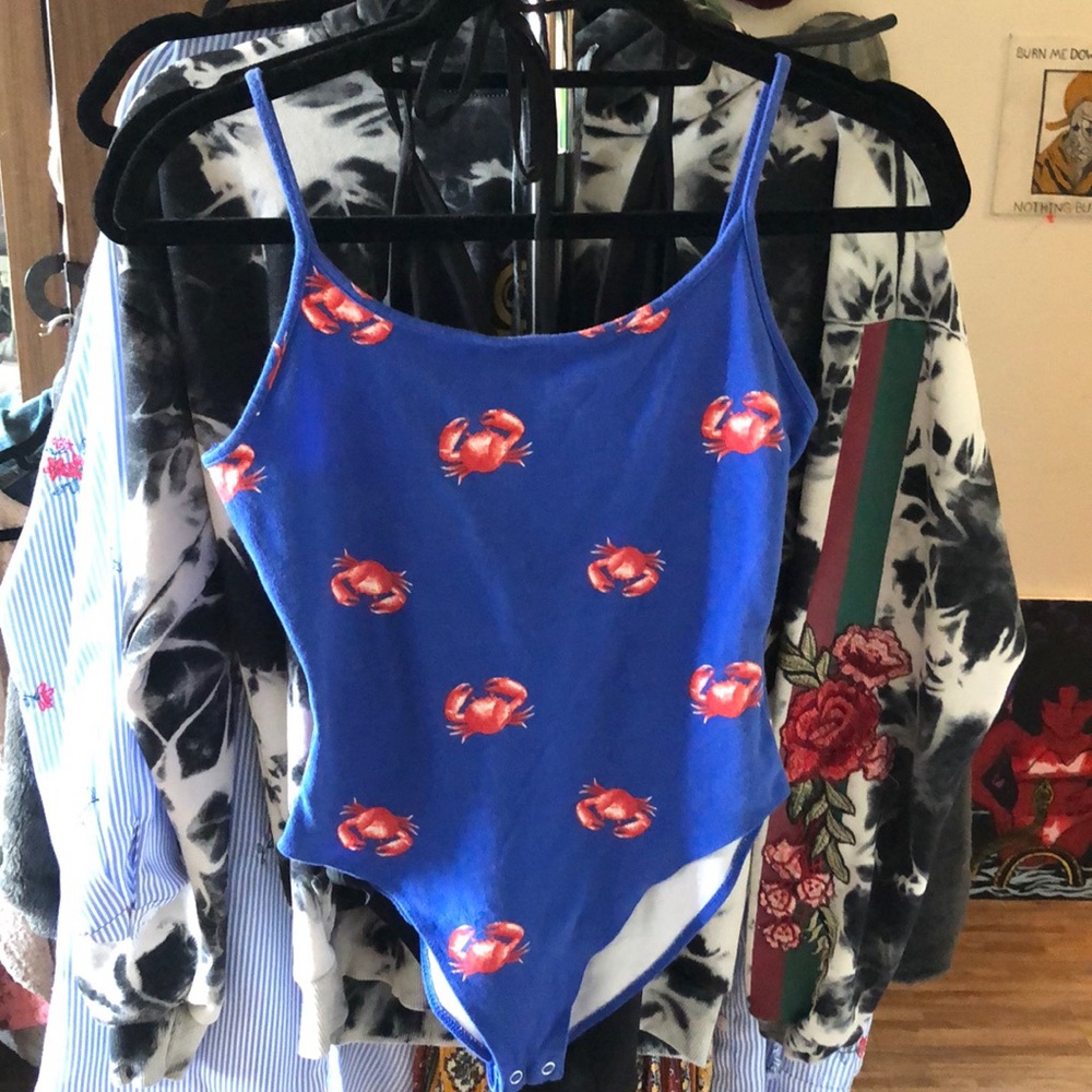 Blue onesie with little crabs